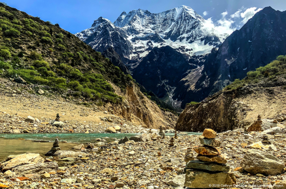 Many little piles of rocks, or chörten, can be seen by the shores of Birendra lake. Constructed by visitors to honour their loved ones. Their shape resembles that of the stupas, so prominent in Buddhist architecture.